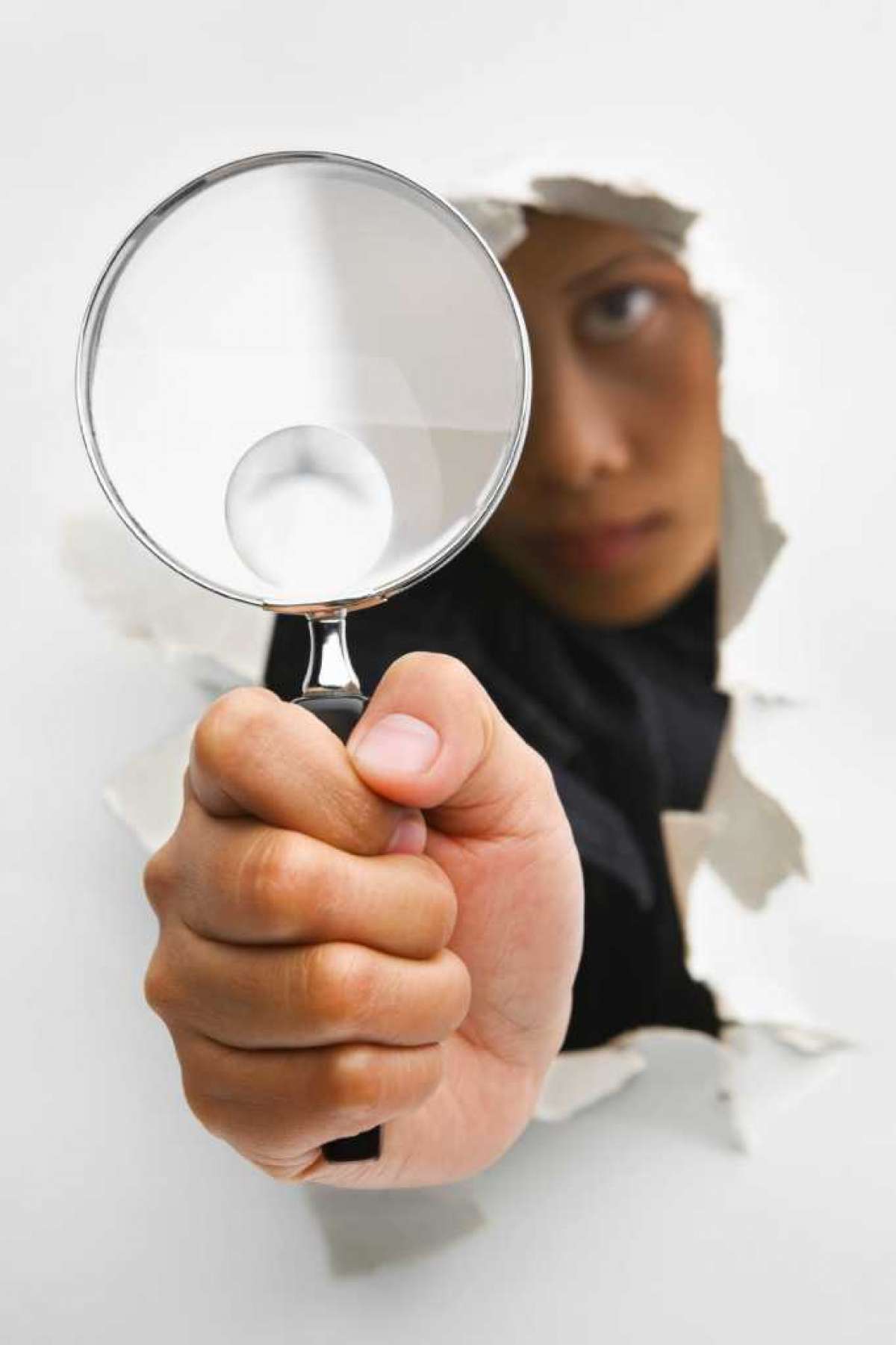 Private Investigator with magnifying glass